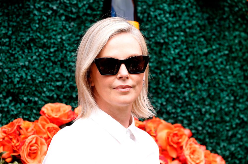 Photo of Charlize Theron wearing shades