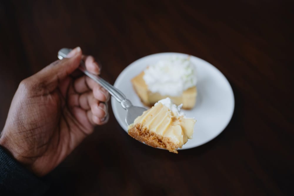 A divorced man eating cake