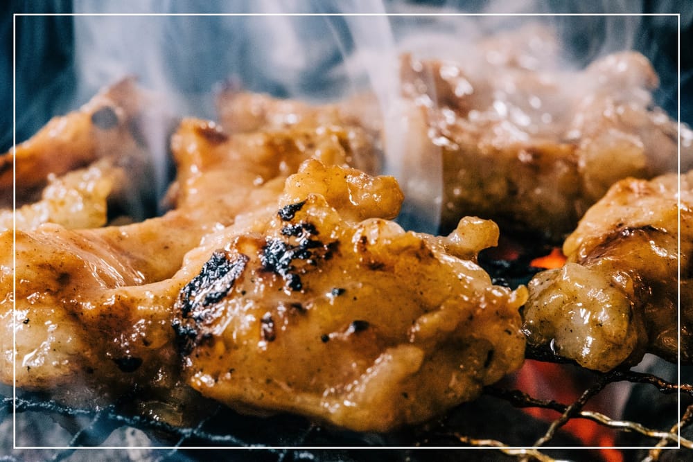 Meat being cooked at a Korean BBQ restaurant