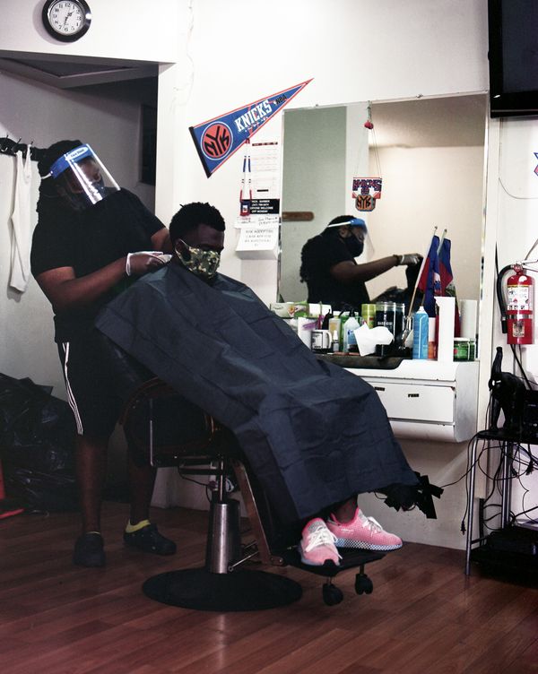 A Brooklyn Barbershop Re-Opens, and the Ghost of Covid-19 Remains