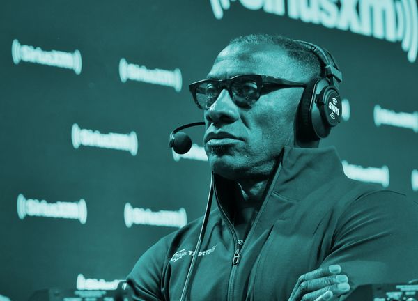 Shannon Sharpe commentating while wearing a headset