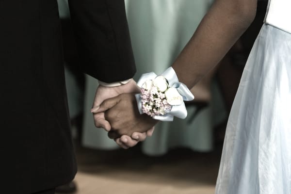 Young couple holding hands